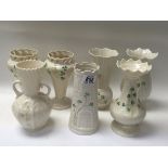 7 Belleek porcelain vases.