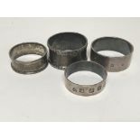Four silver napkin rings with BRITISH hallmarks. (