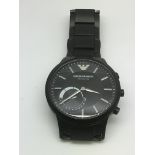 A gents Armani hybrid smart watch.