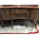 A Georgian mahogany sideboard fitted with six draw