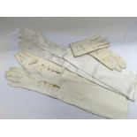 A bag of vintage evening gloves.