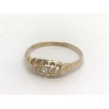 An 18ct gold five stone diamond ring, approx 1.5g