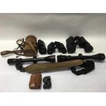 Included is a large assortment of binoculars p, mo
