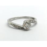 A 9ct white gold ten point solitaire diamond ring,