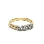 An 18ct gold five stone diamond ring, approx 4.2g