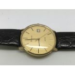 A gents 9ct gold Bulova dress watch.