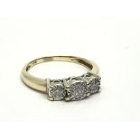A 9ct gold three stone diamond ring, approx 1/4ct,