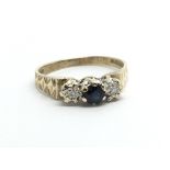 A 9ct gold sapphire and diamond ring, approx 1.7g