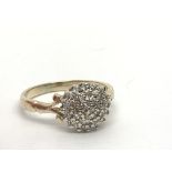 A 9ct gold diamond cluster ring, approx .25ct, app