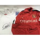 Four signed football shirts including Robbie Fowler and Sol Campbell.