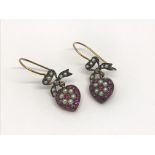 A boxed pair of drop earrings set with rubies and