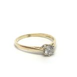 An 18ct gold solitaire diamond ring, approx .33ct,