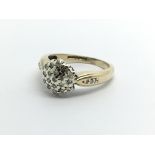 A 9ct gold diamond cluster ring, approx 2.7g and a