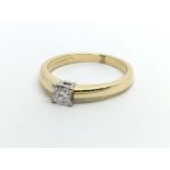 An 18ct gold solitaire diamond ring set with a pri