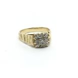 An 18carat gold ring set with a square pattern of