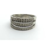 A 9ct white gold five row half eternity ring, appr