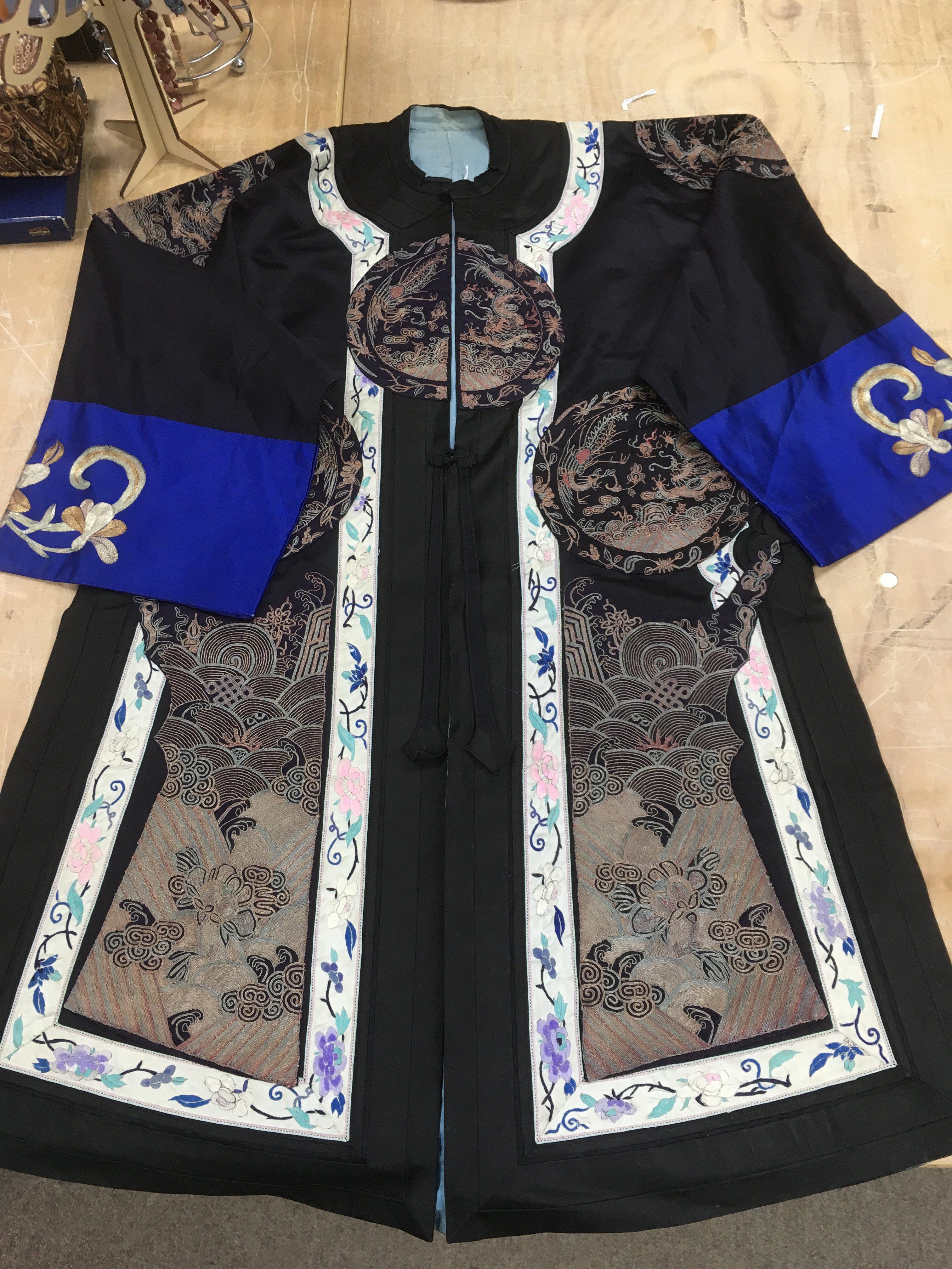 A traditional Chinese lady's embroidered dress.