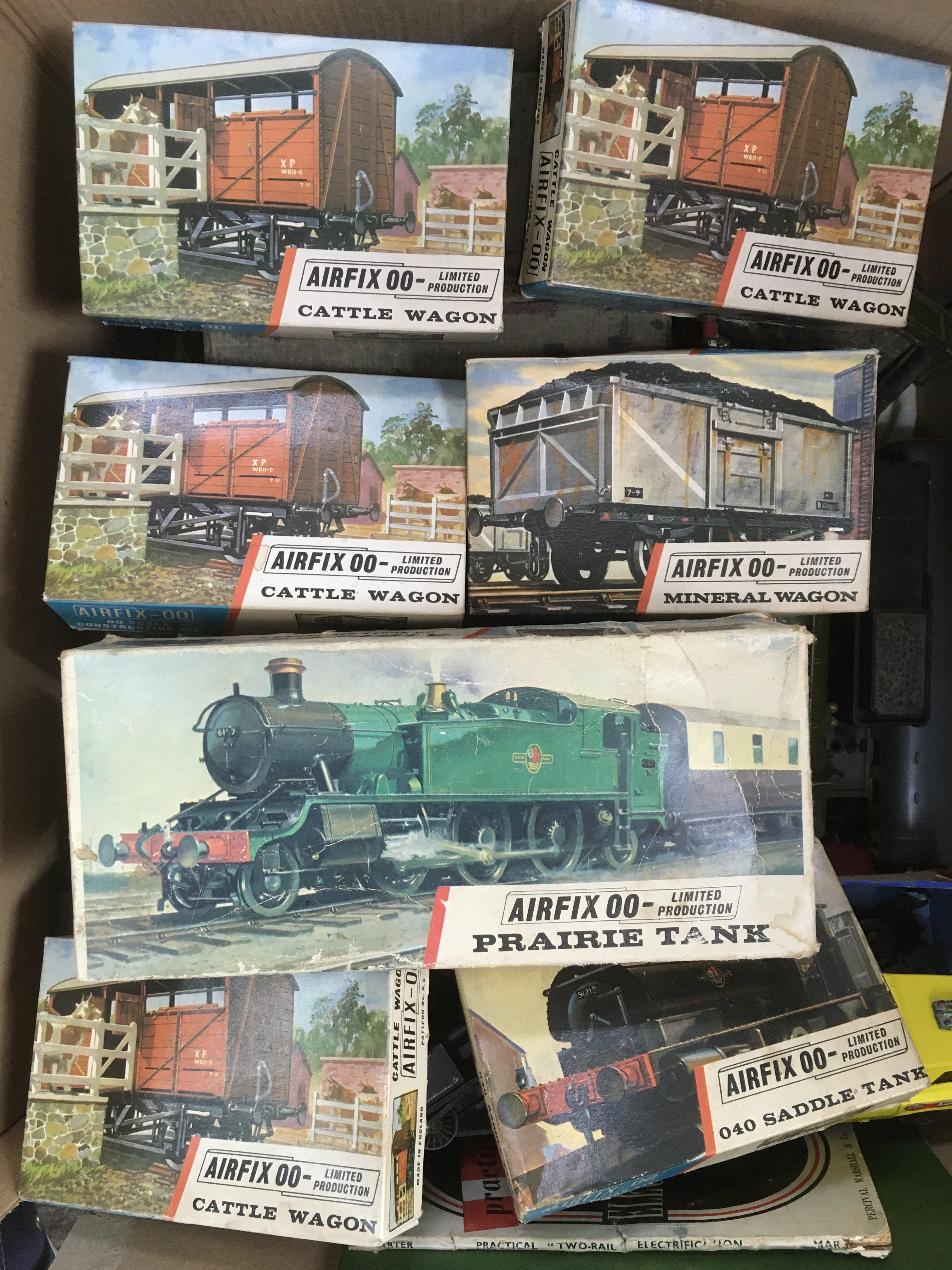 Two boxes of vintage trains, track and accessories