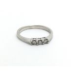 A 9ct white gold three stone diamond ring, approx.