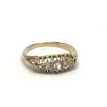 A vintage 18ct gold five stone diamond ring, appro