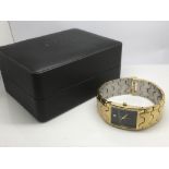 A gents Accurist watch with a black face and set w