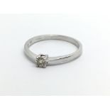 A 9ct white gold solitaire diamond ring, approx.15