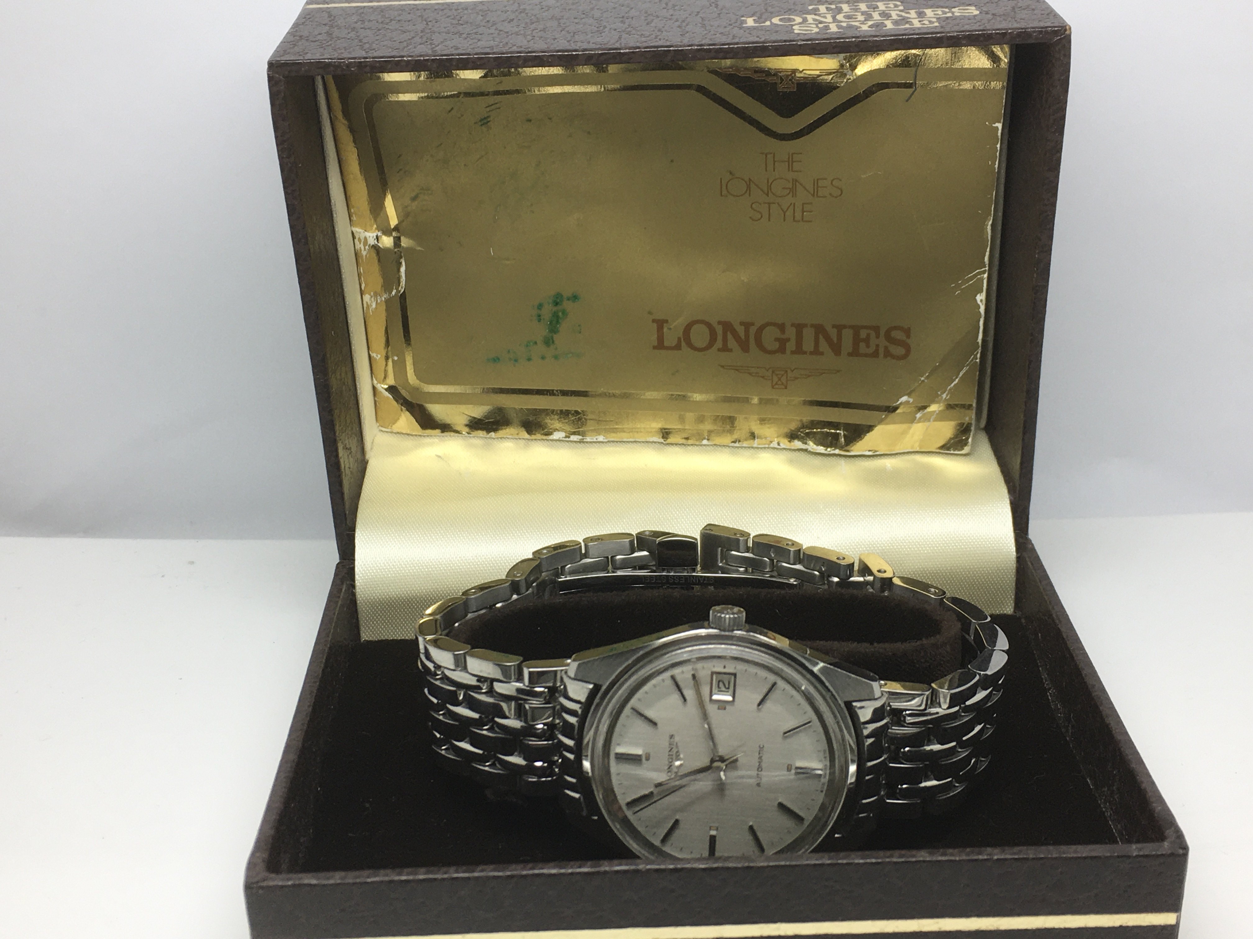 A boxed Gents Longines automatic watch with origin