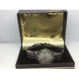 A boxed Gents Longines automatic watch with origin