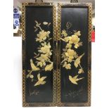 A pair of Chinese lacquered panels inset with moth