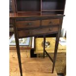 An Edwardian mahogany side table the top with a cr