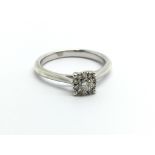 A 9ct white gold diamond cluster ring, approx 1.5c