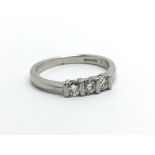 A platinum three stone diamond ring, approx.20ct,