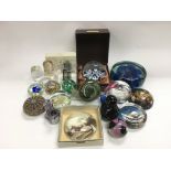 A collection of approx 20 glass paperweights.