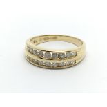 An 18carat gold ring set with two rows of brillian