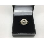 A 9ct diamond set openwork ring, approx 3.5g and a