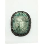 An Egyptian silver and faience scarab beetle brooc