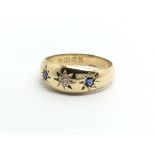 An 18carat gold ring set with sapphire and diamond