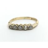 An 18ct gold five stone diamond ring, approx .25ct