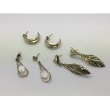 Three pairs of unmarked gold tone earrings, approx