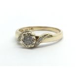 A 9ct gold diamond cluster ring, approx .10ct, app
