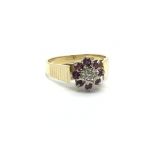 An 18carat gold ring set with a pattern of ruby an