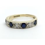 A 9ct gold sapphire and diamond half eternity ring