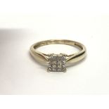 A 9ct gold nine stone diamond ring, approx.15ct, a