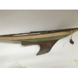 A large Vintage painted wood pond yacht with a wei