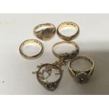 A collection of 9carat gold rings including a smal
