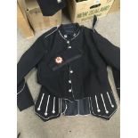 A Scottish Pipers uniform with two jackets hat and