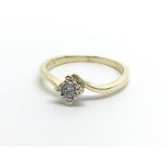 A 9ct gold solitaire diamond ring, approx .10ct, a
