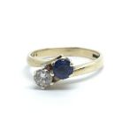 A 9ct gold sapphire and diamond ring, approx .25ct