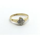 A small 18carat gold ring set with four small diam