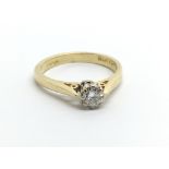 An 18ct gold solitaire diamond ring, approx .25ct,